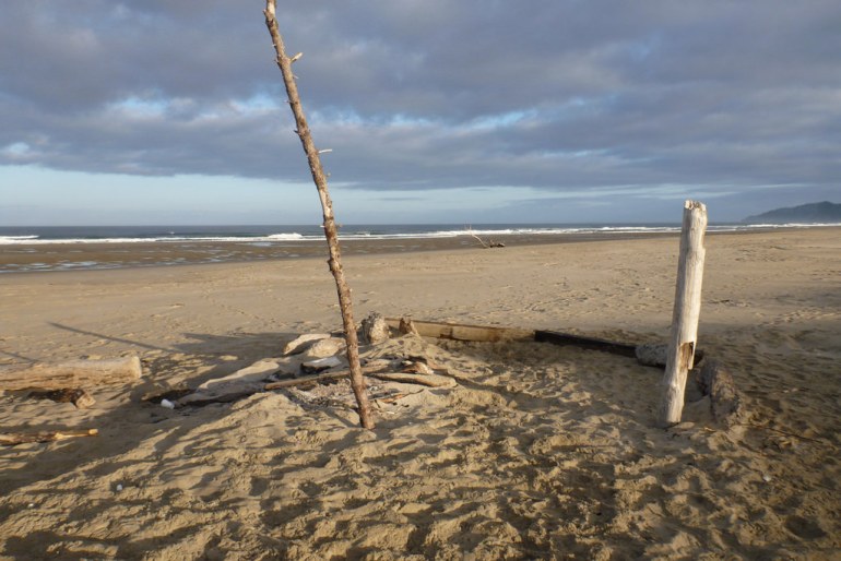 Fort's just about gone; only two upright posts remain