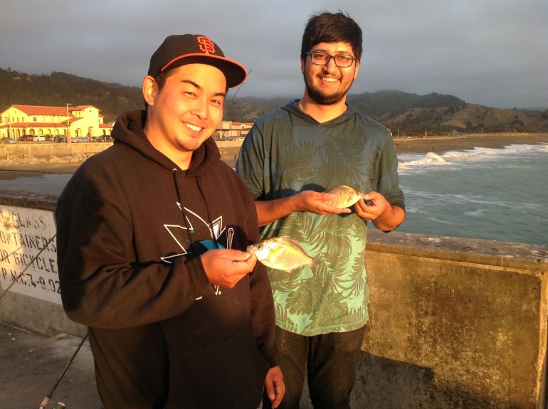 Mike and Saad with walleye and calico