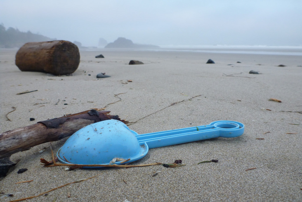 Blue spade on sand