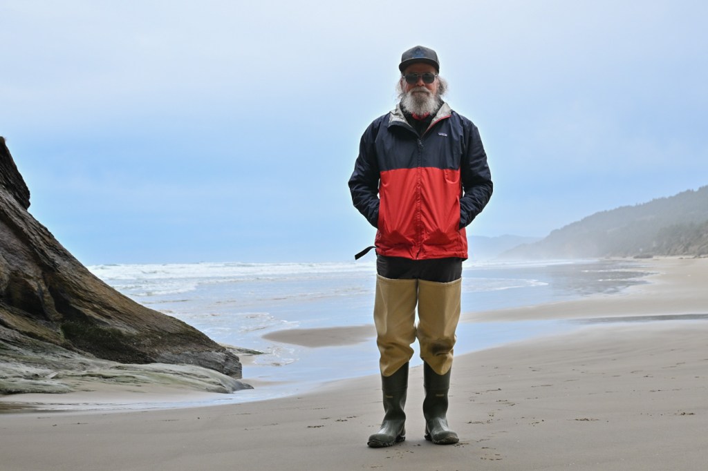 A hazy beach scene featuring a selfie by the author.