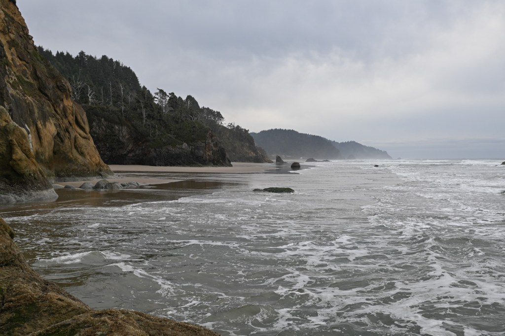 Separated by a series of headlands, a succession of short beaches stretches off into the distance.